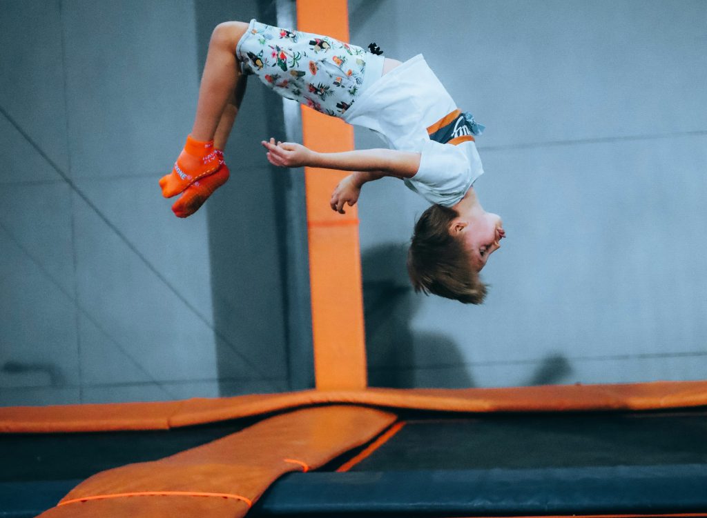 Kids at trampoline park party.